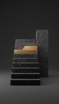 Textured charcoal stairwell with inset gold step